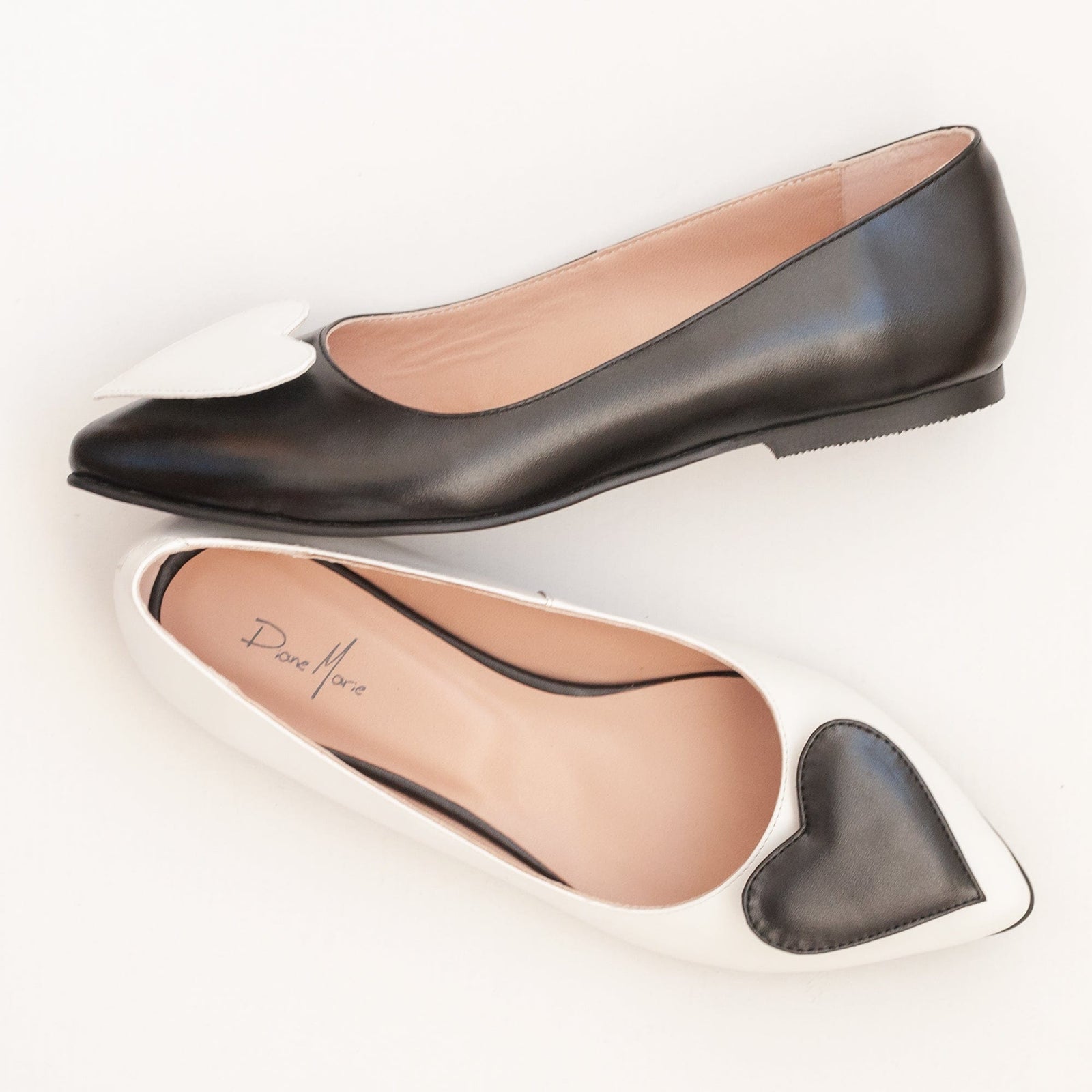 Christina black and white natural leather asymmetric ballet flats